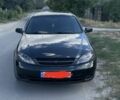 Черный Шевроле Лачетти, объемом двигателя 1.6 л и пробегом 144 тыс. км за 5100 $, фото 1 на Automoto.ua