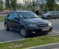 Черный Шевроле Лачетти, объемом двигателя 1.8 л и пробегом 260 тыс. км за 2600 $, фото 1 на Automoto.ua