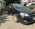 Черный Шевроле Лачетти, объемом двигателя 1.6 л и пробегом 313 тыс. км за 3500 $, фото 2 на Automoto.ua