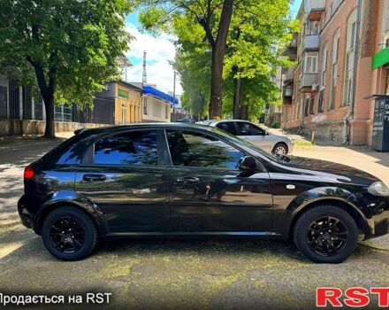 Черный Шевроле Лачетти, объемом двигателя 1.8 л и пробегом 270 тыс. км за 4000 $, фото 6 на Automoto.ua