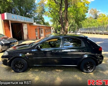 Черный Шевроле Лачетти, объемом двигателя 1.8 л и пробегом 270 тыс. км за 4000 $, фото 4 на Automoto.ua