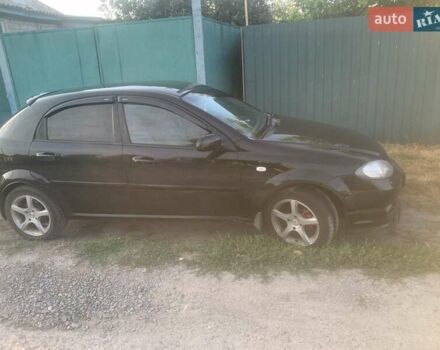 Черный Шевроле Лачетти, объемом двигателя 1.6 л и пробегом 305 тыс. км за 3700 $, фото 6 на Automoto.ua