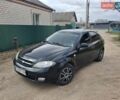 Черный Шевроле Лачетти, объемом двигателя 1.6 л и пробегом 300 тыс. км за 3000 $, фото 1 на Automoto.ua