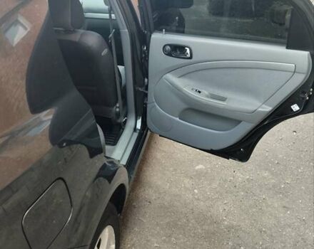 Черный Шевроле Лачетти, объемом двигателя 1.8 л и пробегом 268 тыс. км за 4400 $, фото 15 на Automoto.ua