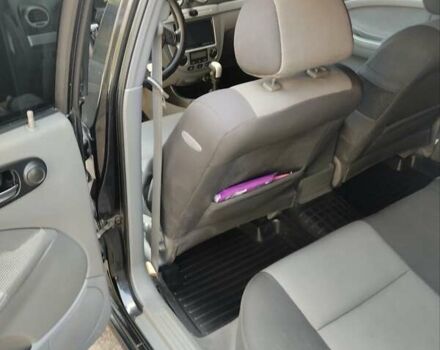 Черный Шевроле Лачетти, объемом двигателя 1.8 л и пробегом 268 тыс. км за 4400 $, фото 1 на Automoto.ua