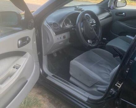 Черный Шевроле Лачетти, объемом двигателя 1.6 л и пробегом 305 тыс. км за 3700 $, фото 2 на Automoto.ua