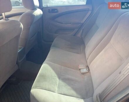 Черный Шевроле Лачетти, объемом двигателя 1.6 л и пробегом 284 тыс. км за 3700 $, фото 5 на Automoto.ua