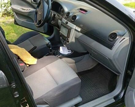 Черный Шевроле Лачетти, объемом двигателя 1.8 л и пробегом 218 тыс. км за 4200 $, фото 5 на Automoto.ua