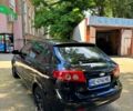 Черный Шевроле Лачетти, объемом двигателя 1.8 л и пробегом 270 тыс. км за 4000 $, фото 2 на Automoto.ua