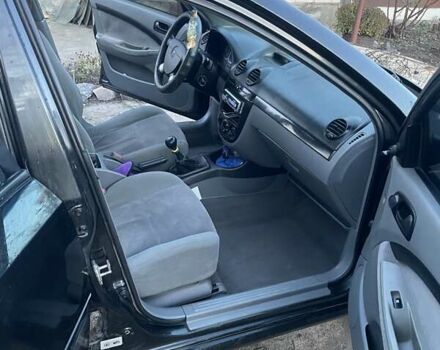 Чорний Шевроле Лачетті, об'ємом двигуна 1.6 л та пробігом 219 тис. км за 3300 $, фото 11 на Automoto.ua