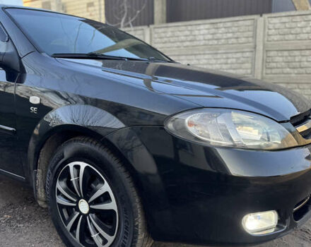 Черный Шевроле Лачетти, объемом двигателя 1.6 л и пробегом 209 тыс. км за 3850 $, фото 12 на Automoto.ua