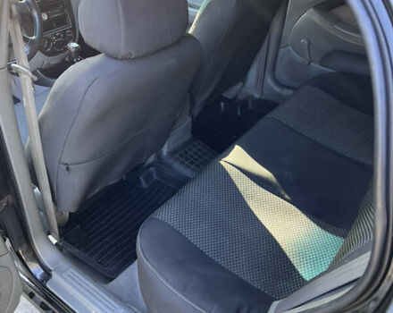 Черный Шевроле Лачетти, объемом двигателя 1.6 л и пробегом 334 тыс. км за 3899 $, фото 8 на Automoto.ua