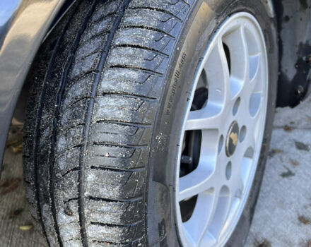 Черный Шевроле Лачетти, объемом двигателя 1.6 л и пробегом 334 тыс. км за 3899 $, фото 13 на Automoto.ua