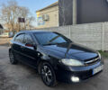 Черный Шевроле Лачетти, объемом двигателя 1.6 л и пробегом 209 тыс. км за 3850 $, фото 2 на Automoto.ua