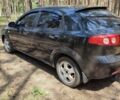 Черный Шевроле Лачетти, объемом двигателя 1.6 л и пробегом 205 тыс. км за 3800 $, фото 2 на Automoto.ua