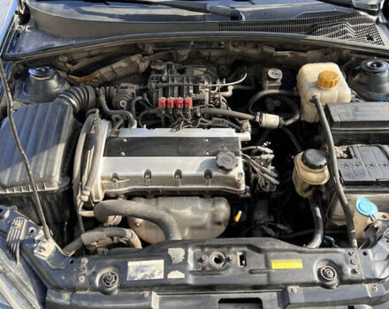 Черный Шевроле Лачетти, объемом двигателя 1.6 л и пробегом 334 тыс. км за 3899 $, фото 12 на Automoto.ua