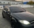Черный Шевроле Лачетти, объемом двигателя 1.6 л и пробегом 468 тыс. км за 3361 $, фото 1 на Automoto.ua