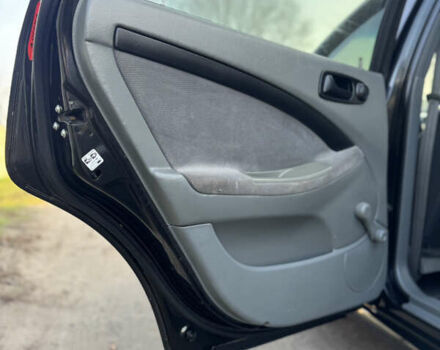 Черный Шевроле Лачетти, объемом двигателя 1.6 л и пробегом 209 тыс. км за 3850 $, фото 25 на Automoto.ua