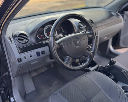 Черный Шевроле Лачетти, объемом двигателя 1.6 л и пробегом 209 тыс. км за 3850 $, фото 15 на Automoto.ua