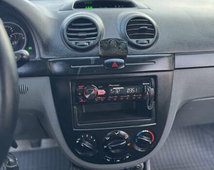 Черный Шевроле Лачетти, объемом двигателя 1.6 л и пробегом 209 тыс. км за 3850 $, фото 26 на Automoto.ua