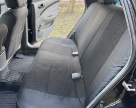 Черный Шевроле Лачетти, объемом двигателя 1.6 л и пробегом 209 тыс. км за 3850 $, фото 16 на Automoto.ua