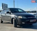 Чорний Шевроле Лачетті, об'ємом двигуна 1.6 л та пробігом 241 тис. км за 2690 $, фото 10 на Automoto.ua