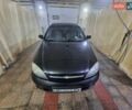 Черный Шевроле Лачетти, объемом двигателя 1.6 л и пробегом 229 тыс. км за 4200 $, фото 1 на Automoto.ua