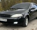 Черный Шевроле Лачетти, объемом двигателя 1.8 л и пробегом 205 тыс. км за 4900 $, фото 1 на Automoto.ua