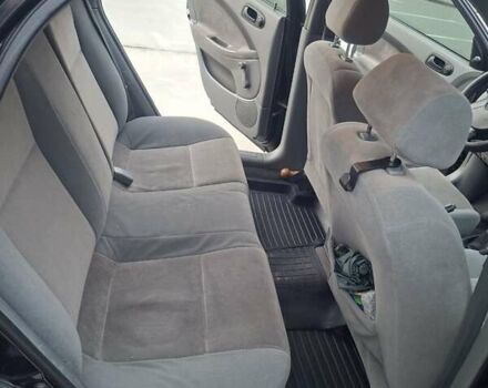 Черный Шевроле Лачетти, объемом двигателя 1.6 л и пробегом 217 тыс. км за 4000 $, фото 9 на Automoto.ua