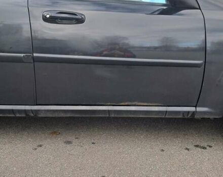 Черный Шевроле Лачетти, объемом двигателя 1.8 л и пробегом 200 тыс. км за 3300 $, фото 15 на Automoto.ua