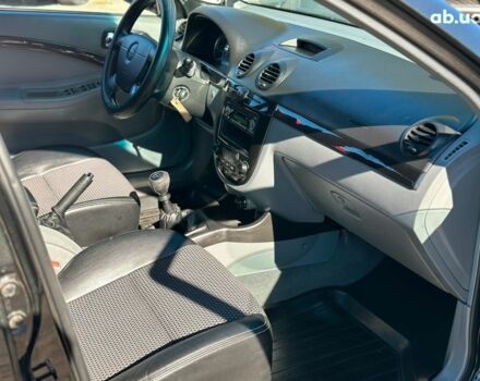 Черный Шевроле Лачетти, объемом двигателя 1.8 л и пробегом 146 тыс. км за 4990 $, фото 32 на Automoto.ua