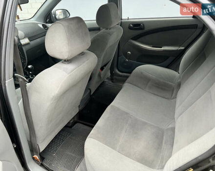 Черный Шевроле Лачетти, объемом двигателя 1.6 л и пробегом 110 тыс. км за 4600 $, фото 50 на Automoto.ua