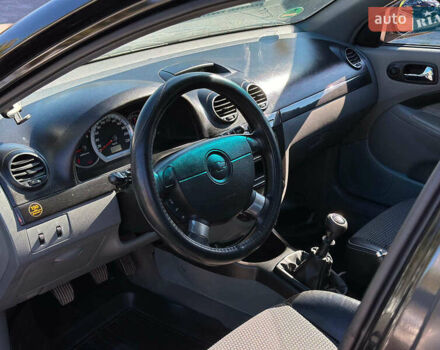 Черный Шевроле Лачетти, объемом двигателя 1.8 л и пробегом 146 тыс. км за 4990 $, фото 25 на Automoto.ua