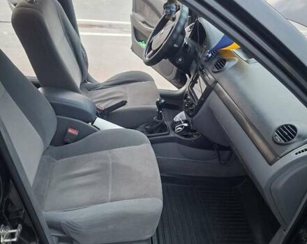 Черный Шевроле Лачетти, объемом двигателя 1.6 л и пробегом 217 тыс. км за 4000 $, фото 13 на Automoto.ua