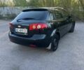 Черный Шевроле Лачетти, объемом двигателя 1.6 л и пробегом 153 тыс. км за 4199 $, фото 2 на Automoto.ua