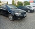 Черный Шевроле Лачетти, объемом двигателя 1.6 л и пробегом 240 тыс. км за 3800 $, фото 1 на Automoto.ua