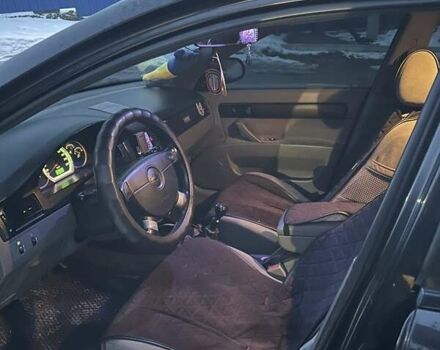 Черный Шевроле Лачетти, объемом двигателя 1.6 л и пробегом 281 тыс. км за 3900 $, фото 14 на Automoto.ua