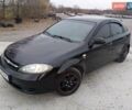 Черный Шевроле Лачетти, объемом двигателя 1.6 л и пробегом 210 тыс. км за 3200 $, фото 1 на Automoto.ua
