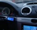 Черный Шевроле Лачетти, объемом двигателя 1.8 л и пробегом 152 тыс. км за 4400 $, фото 1 на Automoto.ua