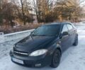 Черный Шевроле Лачетти, объемом двигателя 1.6 л и пробегом 294 тыс. км за 4500 $, фото 1 на Automoto.ua