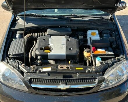 Черный Шевроле Лачетти, объемом двигателя 1.8 л и пробегом 146 тыс. км за 4990 $, фото 36 на Automoto.ua