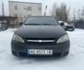 Черный Шевроле Лачетти, объемом двигателя 1.6 л и пробегом 320 тыс. км за 2198 $, фото 1 на Automoto.ua