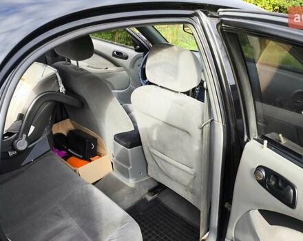 Черный Шевроле Лачетти, объемом двигателя 1.6 л и пробегом 251 тыс. км за 3500 $, фото 15 на Automoto.ua