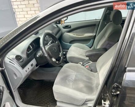 Черный Шевроле Лачетти, объемом двигателя 1.6 л и пробегом 110 тыс. км за 4600 $, фото 42 на Automoto.ua