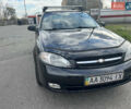 Черный Шевроле Лачетти, объемом двигателя 1.6 л и пробегом 110 тыс. км за 4600 $, фото 19 на Automoto.ua