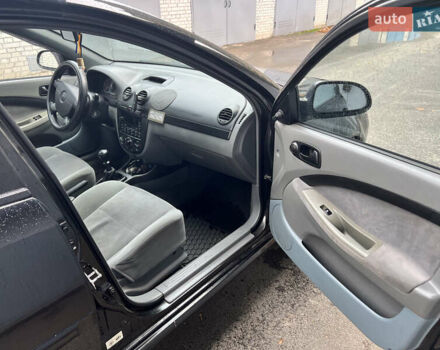 Черный Шевроле Лачетти, объемом двигателя 1.6 л и пробегом 110 тыс. км за 4600 $, фото 48 на Automoto.ua