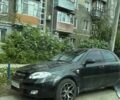 Черный Шевроле Лачетти, объемом двигателя 1.8 л и пробегом 240 тыс. км за 1100 $, фото 1 на Automoto.ua