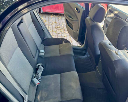 Черный Шевроле Лачетти, объемом двигателя 1.8 л и пробегом 142 тыс. км за 7400 $, фото 9 на Automoto.ua