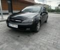 Черный Шевроле Лачетти, объемом двигателя 1.6 л и пробегом 150 тыс. км за 4800 $, фото 1 на Automoto.ua