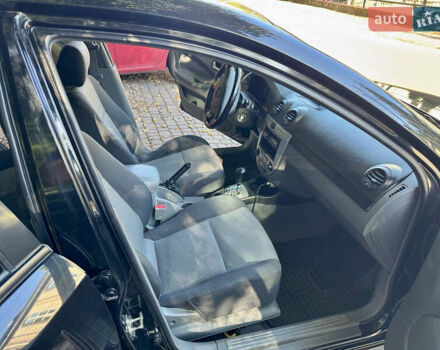 Черный Шевроле Лачетти, объемом двигателя 1.8 л и пробегом 142 тыс. км за 7400 $, фото 10 на Automoto.ua